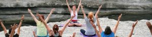 A group of people doing yoga