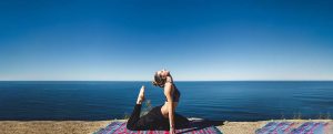 A lady doing Yoga at India Yoga School.