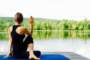 A lady doing Yoga at India Yoga School.