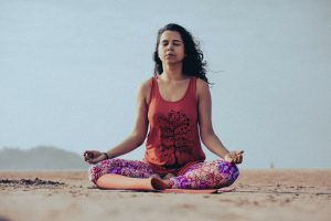 A lady doing Yoga at India Yoga School.