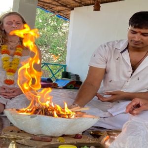 People are doing fire ritual at India Yoga School.